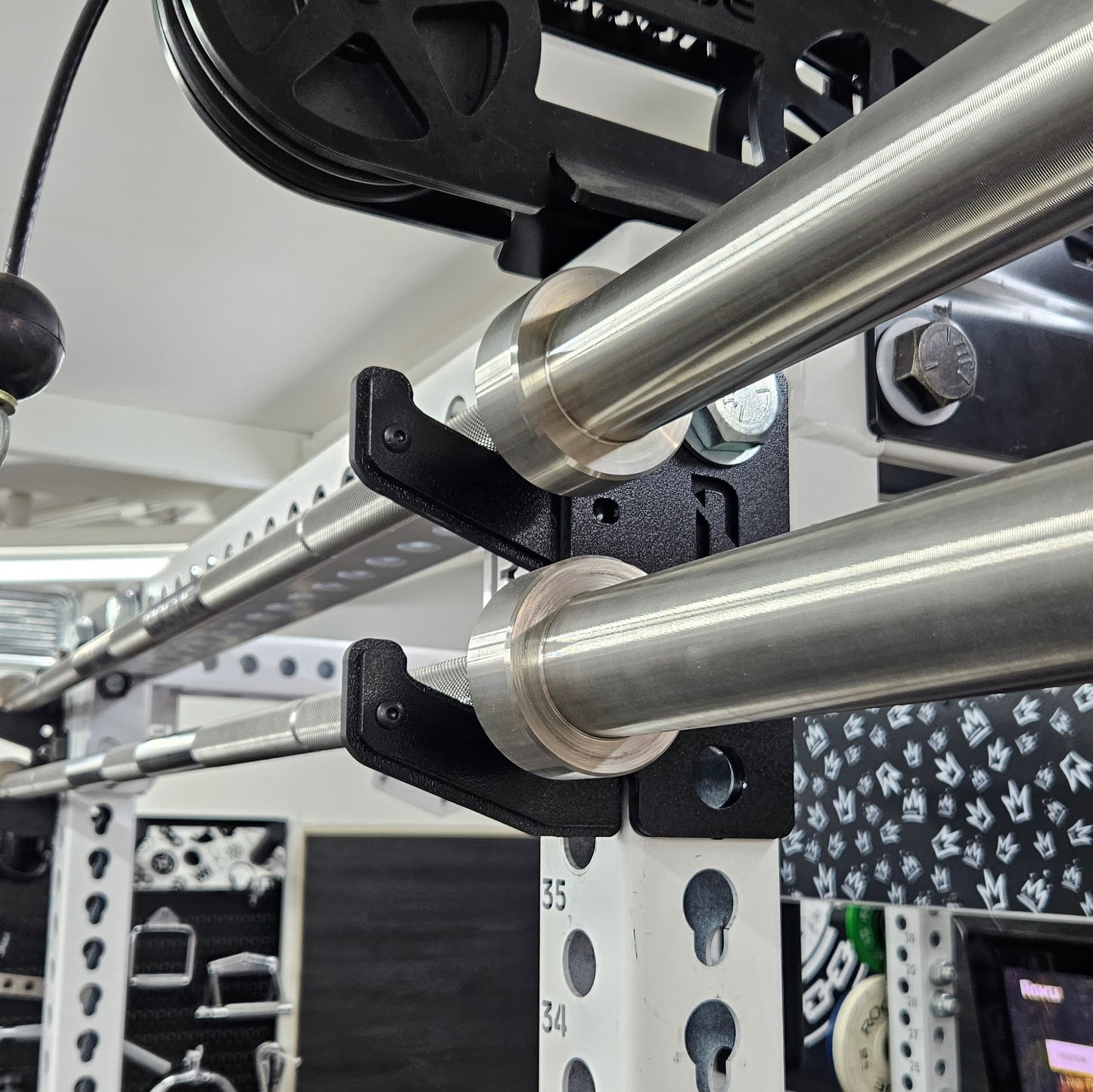 Close-up of steel plate and liner of The Dock, compatible with 1-inch power rack