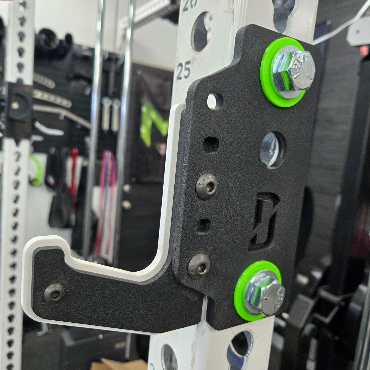 Side view of Single-Hole Adapter installed between rack upright and attachment for size conversion