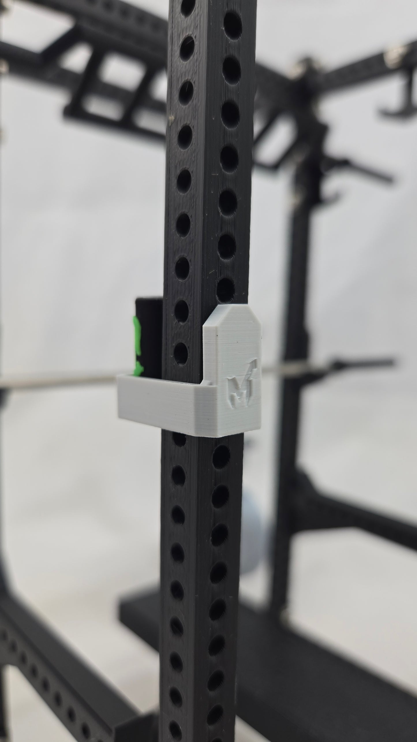 Miniature squat rack accessory