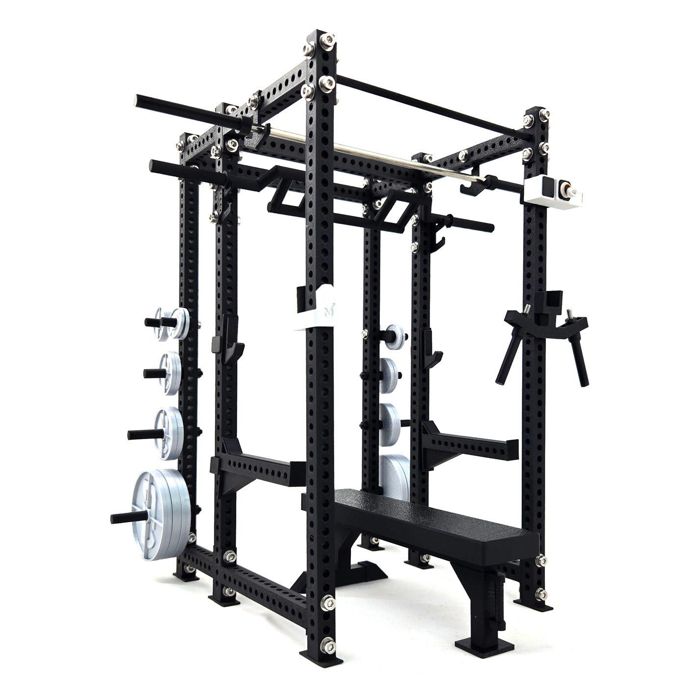 Black miniature power rack with weight plates on a white background