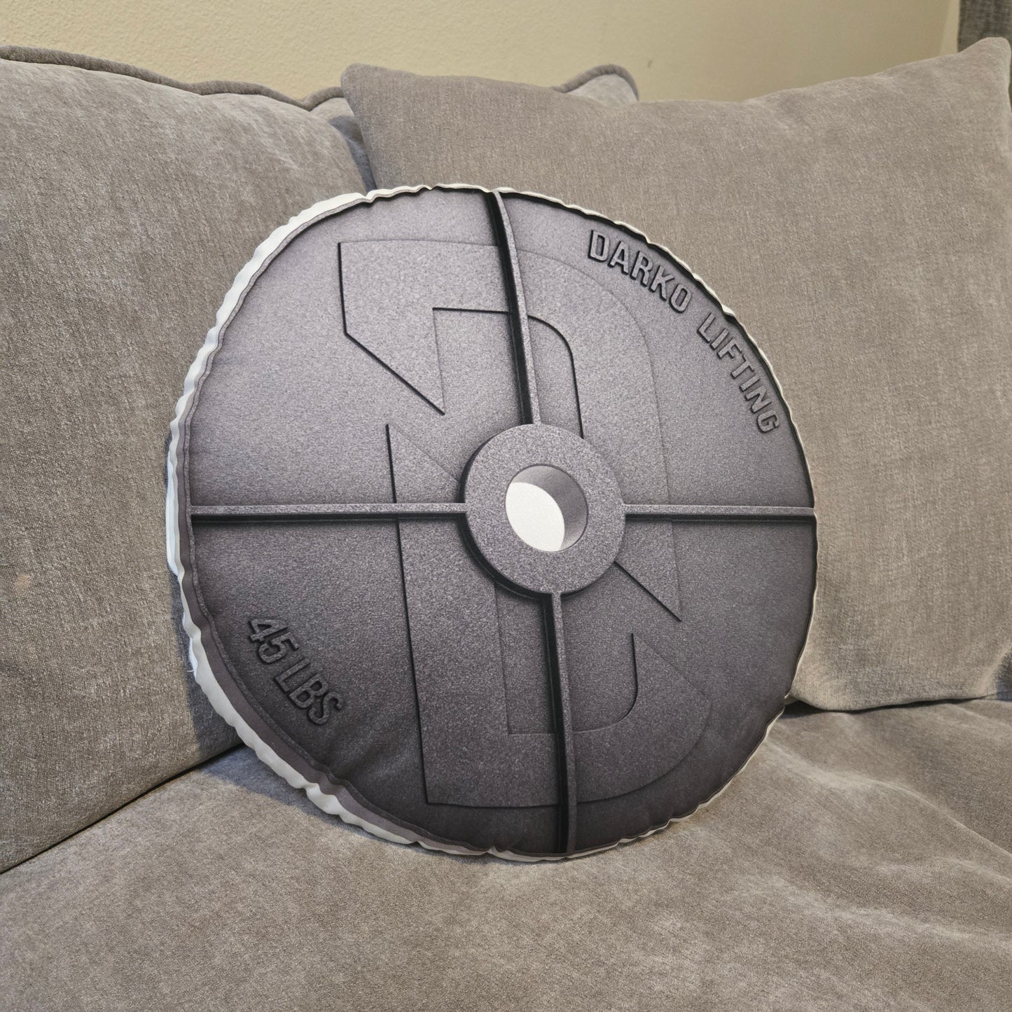 Gains Pillow displayed on a couch for fitness-themed décor