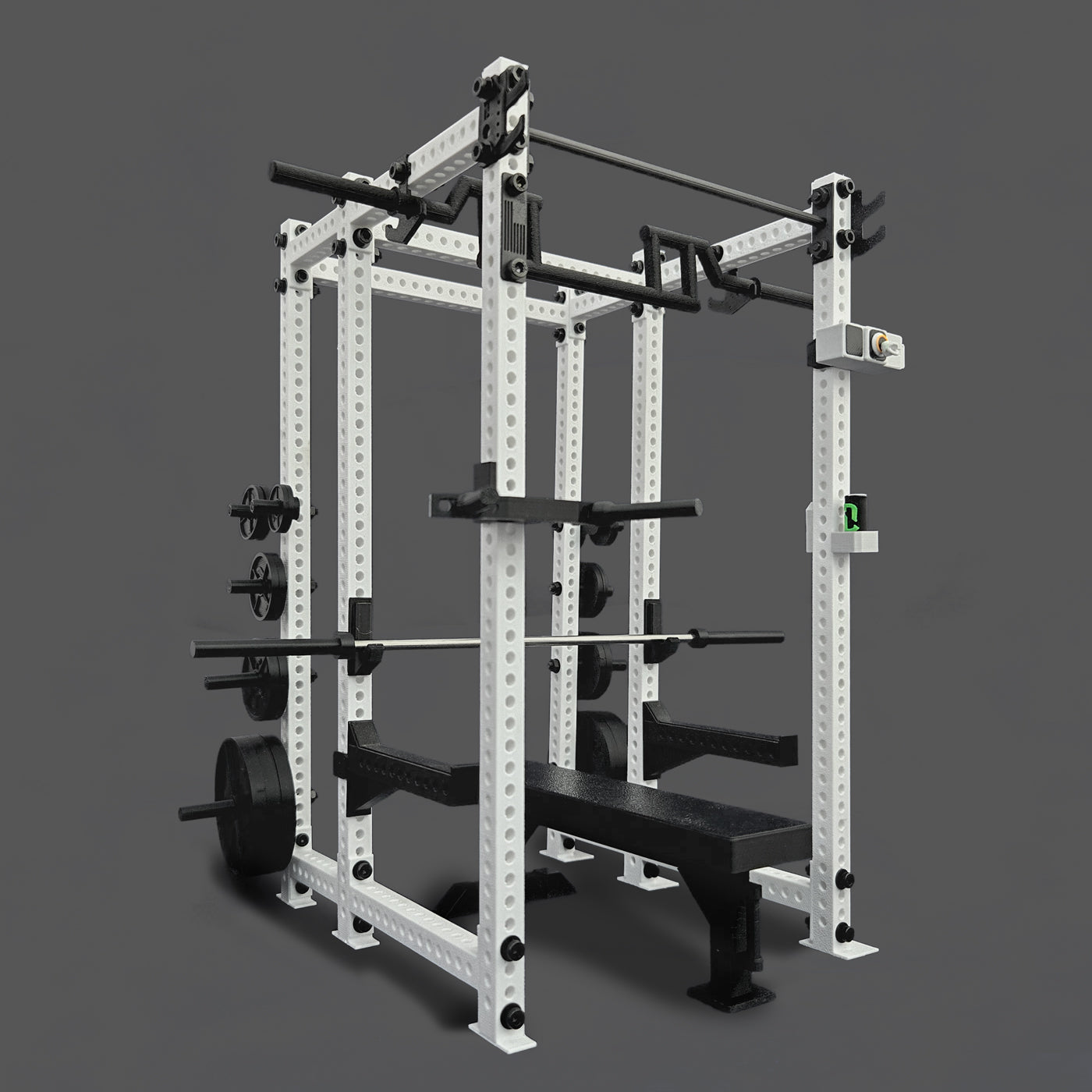 Gym Miniature Squat Rack power rack with weight plates and bench on a gray background