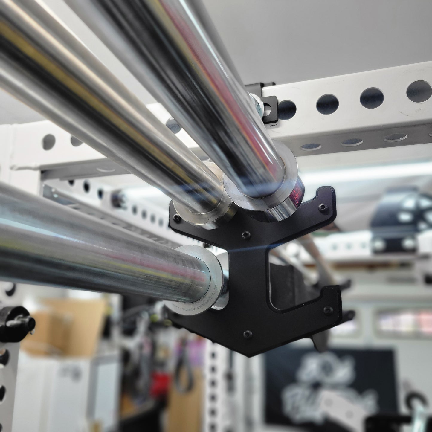 Side profile of the Double Decker Barbell Anchor illustrating compact, space-saving design for garage gyms